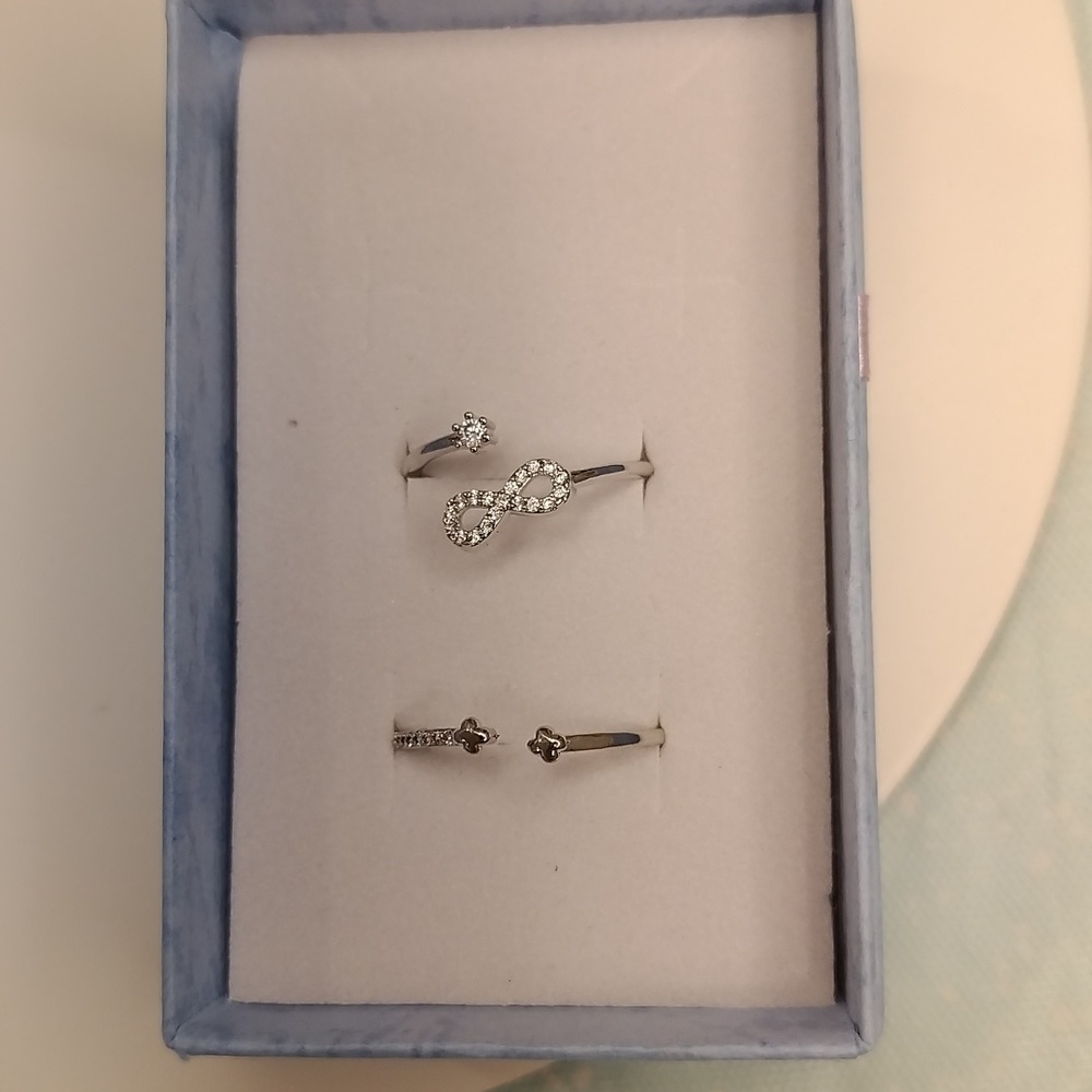 Dainty infinity and clover ring set